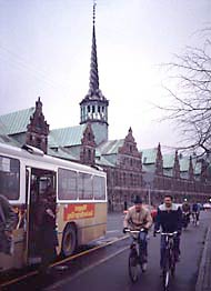 Bikes, busses and pedestrians co-exisisting on Copenhagen street.