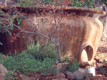 Ferro cement water tank shaped like a giant urn
